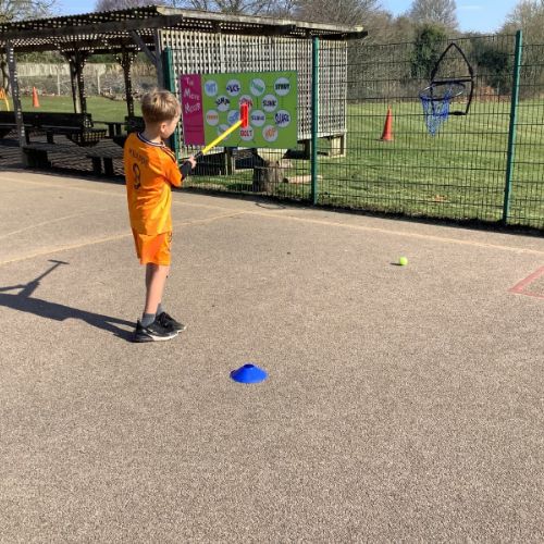 Year 5 & 6 enjoying learning to play golf with our community outreach teacher
